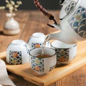 Vintage Porcelain Hand-painted Seawater Japanese Teapot And Cup Set With Rattan Woven Bamboo Handle