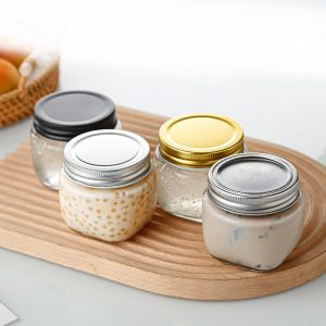 Multi-functional Small Cute Clear Glass Bulk Mason Candy Jars For Candy Table With Multi-colored Lids