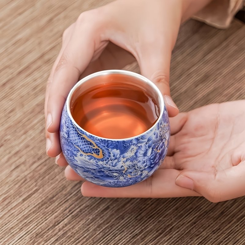 Vintage Chinese Blue And White With Silver Gilding Ceramic Blue Dragon Ten Thousand Flowers Pattern Tea Cup Vintage Chinese Blue And White With Silver Gilding Ceramic Blue Dragon Ten Thousand Flowers Pattern Tea Cup
