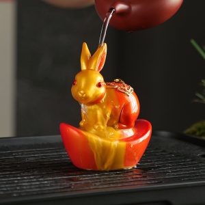 Cute Color Changing Ingot Bunny Resin Tea Pets For Sale Have Good Meaning