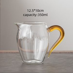 Japanese Traditional Tea Ceremony Penguin-shaped Clear Glass Gong Dao Bei With Yellow Handle For Gongfu Tea