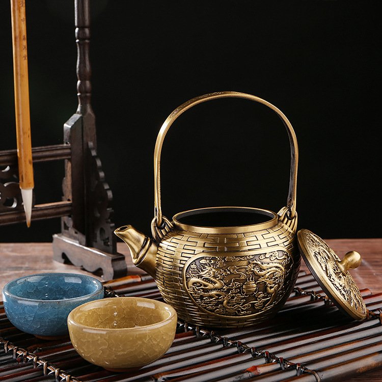 Traditional Luxurious Dragon And Phoenix Theme Weave Antique Brass Tea Kettle With Lifting Beam Traditional Luxurious Dragon And Phoenix Theme Weave Antique Brass Tea Kettle With Lifting Beam