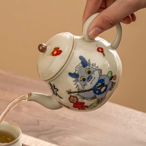 Vintage Porcelain Pear-shaped Year Of The Japanese Dragon Teapot And Tea Boat Set With Cute Cartoon Dragon Pattern