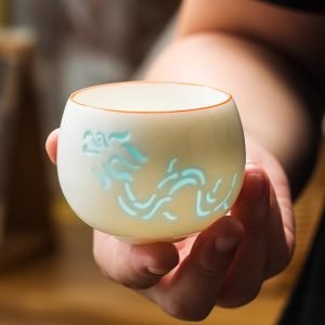 White Ceramic Hollowed Out Delicate Glaze Chinese Simplified Dragon And Phoenix Theme Gongfu Tea Cup