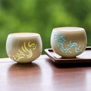 White Ceramic Hollowed Out Delicate Glaze Chinese Simplified Dragon And Phoenix Theme Gongfu Tea Cup